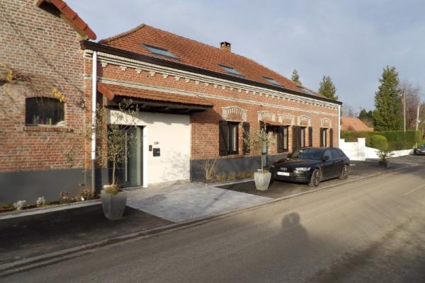 Rénovation, restructuration et extension d'une ancienne ferme en L.
